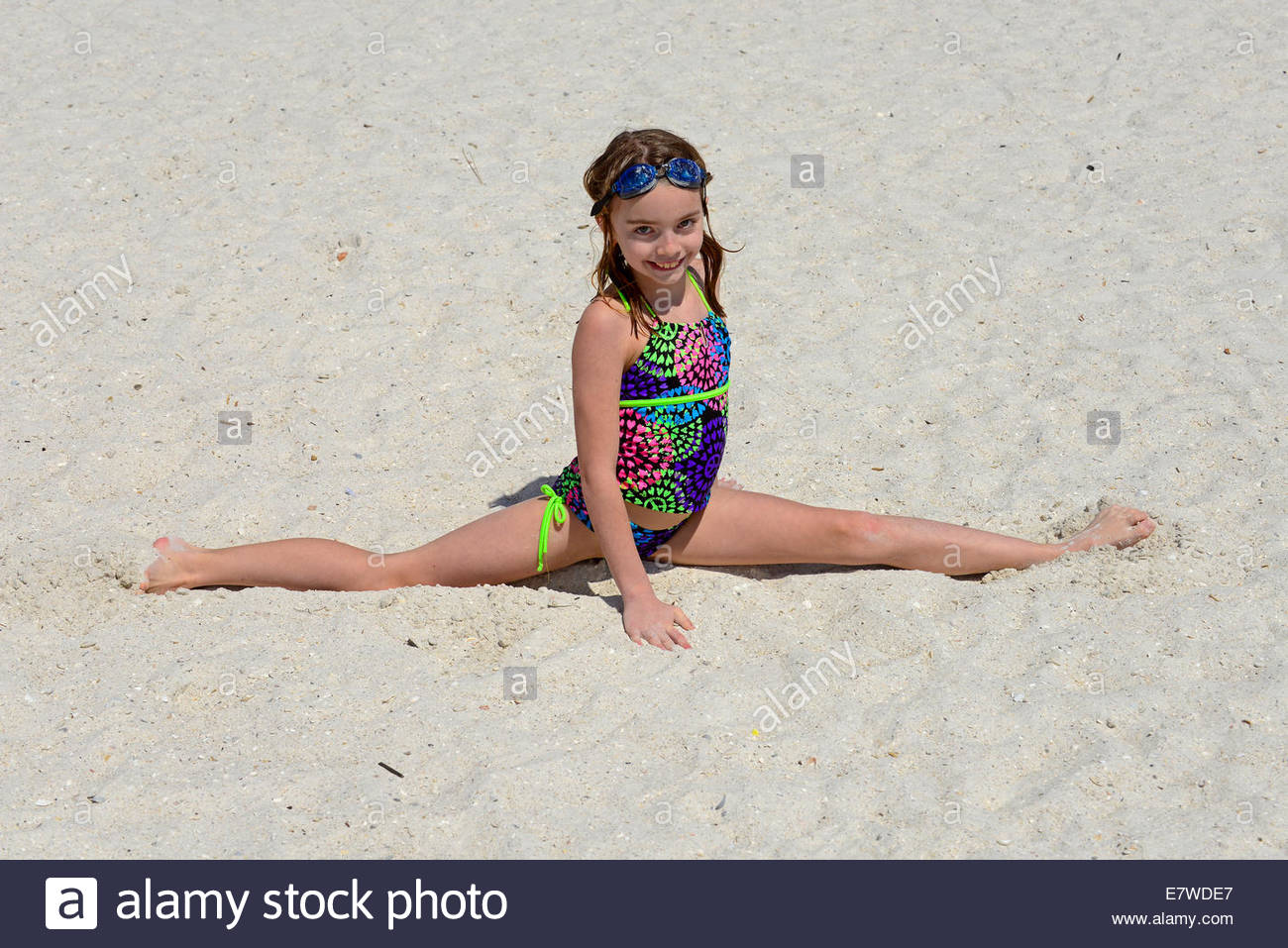 Girls doing splits in shorts
