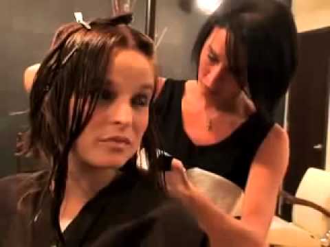 Video of woman getting head shaved