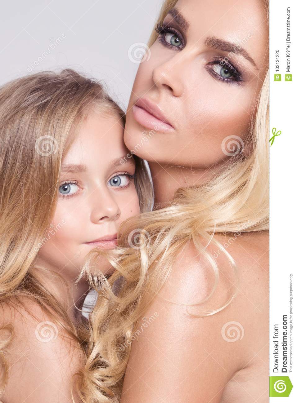 Naked mother and daughter