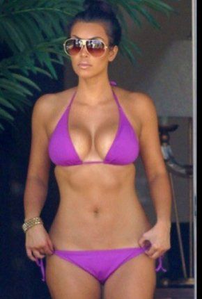 Kim kardashian in a purple bikini