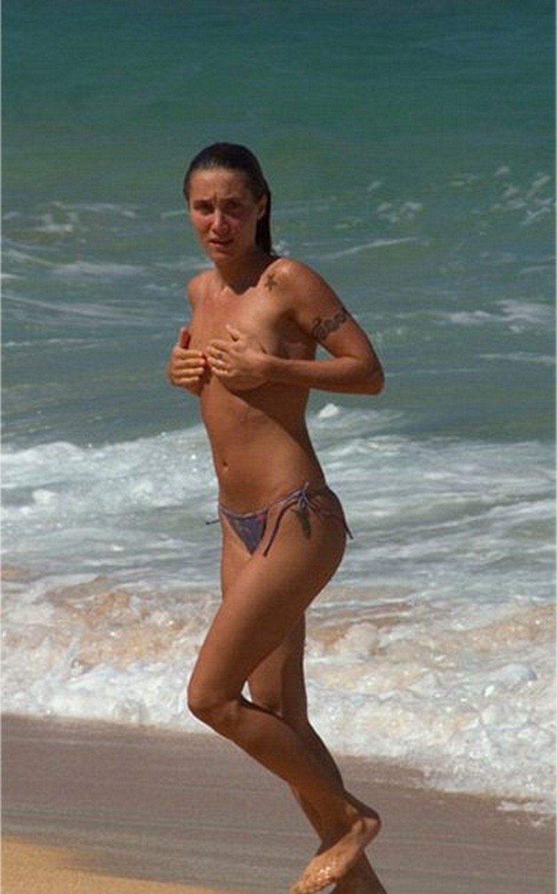 Embarrassed nude female beach