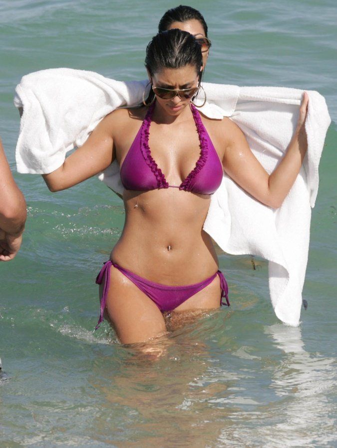 Kim kardashian in a purple bikini