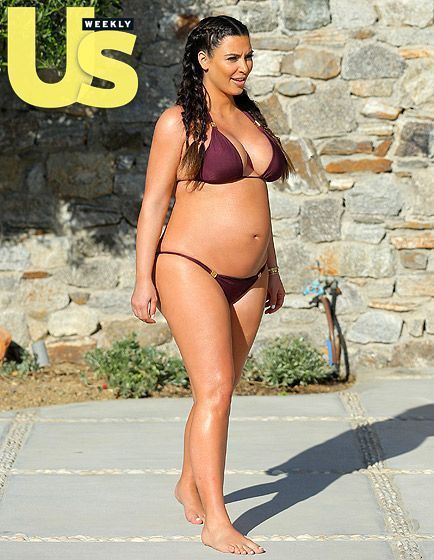 Bulldog reccomend Kim kardashian in a purple bikini